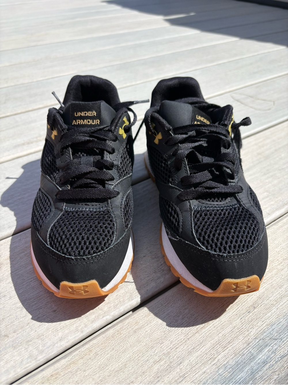 Under Armour Kids Black and Gold Low-Top Sneakers